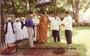 2001 February Planting a sacred Bodhi tree as a peace tree on the temple ground at Nairobi - Keny